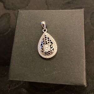 Elegant Sterling Silver Teardrop Pendant With Simulated Diamond Center